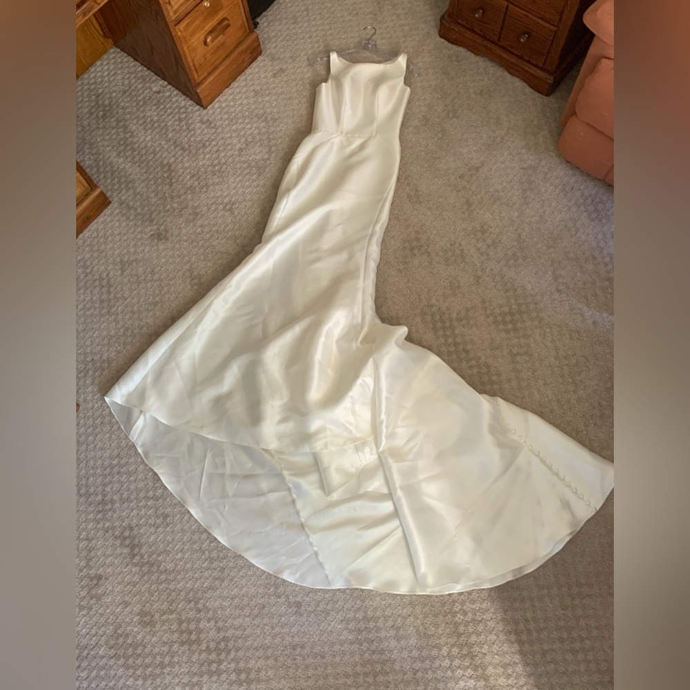 Wedding dress. Ivory. Never worn.